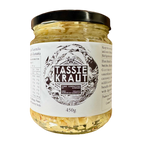 Jar of Tassie Kraut with a white label on a white background